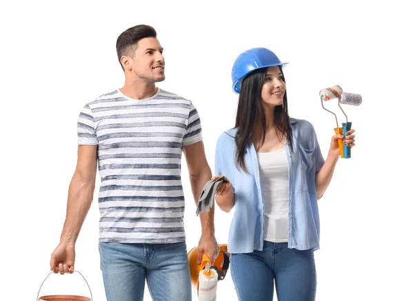 Pareja Joven Con Rodillos Guantes Cubo Latas Pintura Sobre Fondo — Foto de Stock