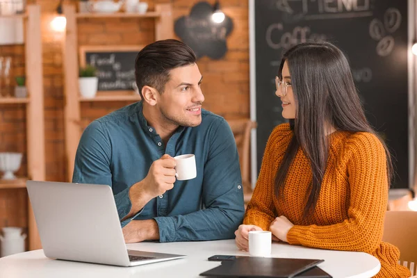 Young Couple Drinking Coffee While Working Laptop Cafe — Stock Photo, Image