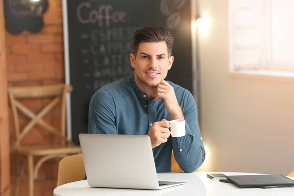 Handsome Young Man Drinking Coffee While Working Laptop Cafe — Stock Photo, Image