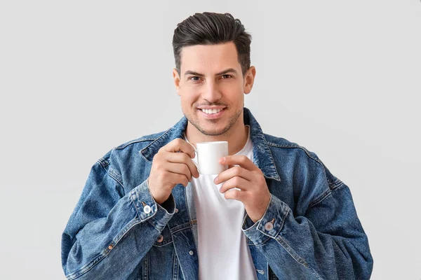 Handsome Young Man Drinking Coffee Light Background — Stock Photo, Image