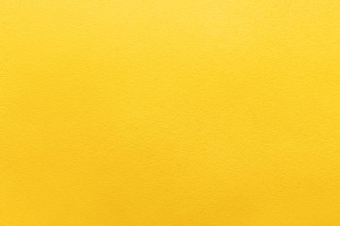 Sarı kumaşın dokusu, yakın plan.