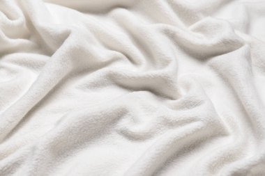 Beyaz kabarık kumaş dokusu, yakın plan.