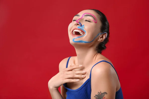 Happy Young Woman Paint Her Face Color Background — Stock Photo, Image