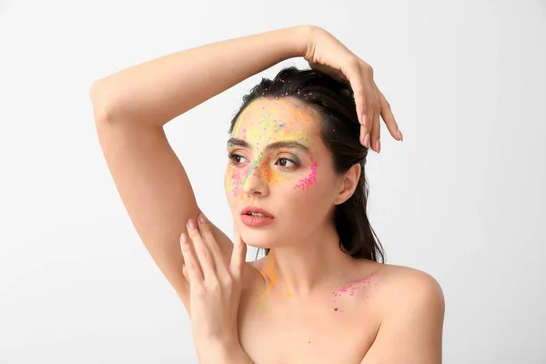 Beautiful Young Woman Paint Her Face Light Background — Stock Photo, Image