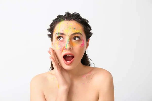 Surprised Young Woman Paint Her Face Light Background — Stock Photo, Image