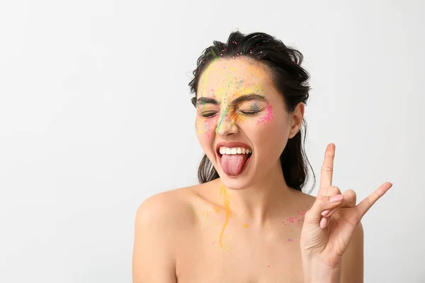Cool Young Woman Paint Her Face Light Background — Stock Photo, Image
