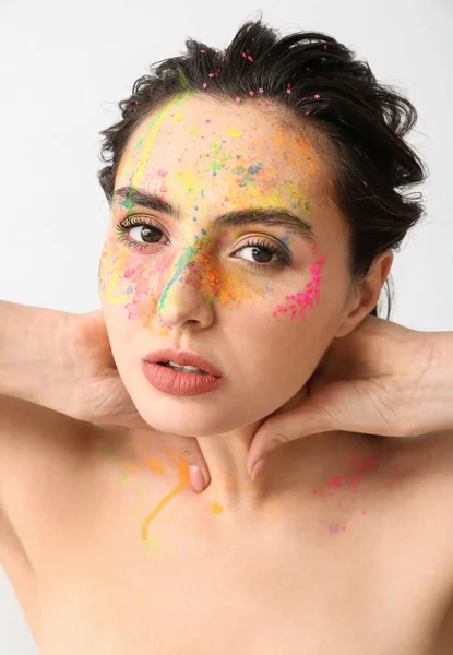Beautiful Young Woman Paint Her Face Light Background — Stock Photo, Image