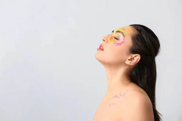 Beautiful Young Woman Paint Her Face Light Background — Stock Photo, Image