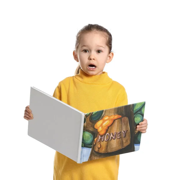 Menina Chocada Com Livro Sobre Fundo Branco — Fotografia de Stock