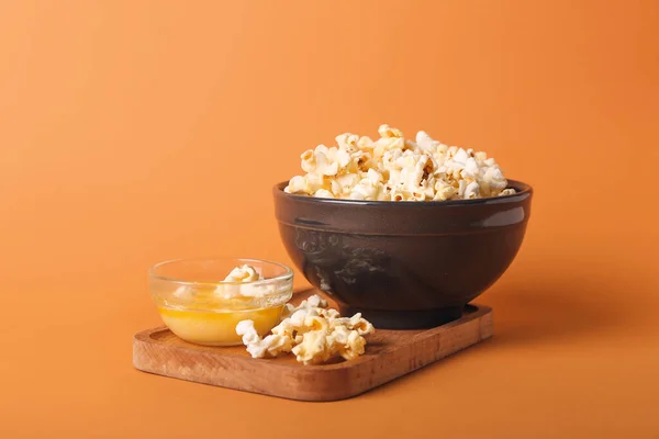 Bowls Tasty Popcorn Butter Color Background — Stock Photo, Image