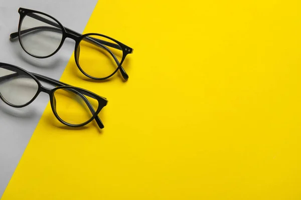 Different Stylish Eyeglasses Color Background — Stock Photo, Image