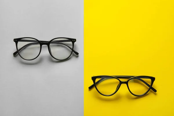 Different Stylish Eyeglasses Color Background — Stock Photo, Image