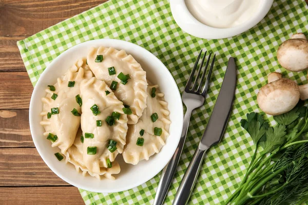 Plate Tasty Dumplings Fresh Ingredients Sour Cream Wooden Background — Stock Photo, Image