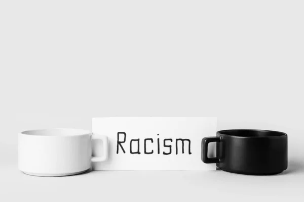 Paper Piece Word Racism Cups White Background — Stock Photo, Image