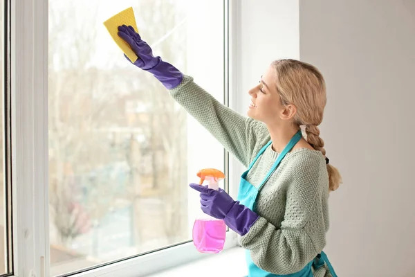 Young Woman Washing Window Her Flat — Stock Photo, Image