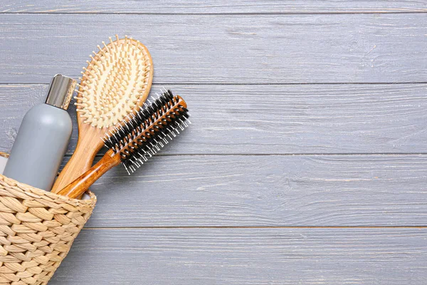 Basket Hair Brushes Bottle Cosmetic Product Wooden Background — Stock Photo, Image