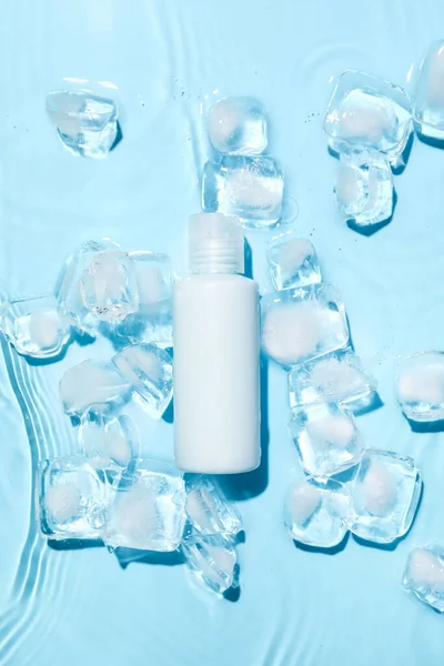 Bottle Cosmetic Product Ice Cubes Water Color Background — Stock Photo, Image