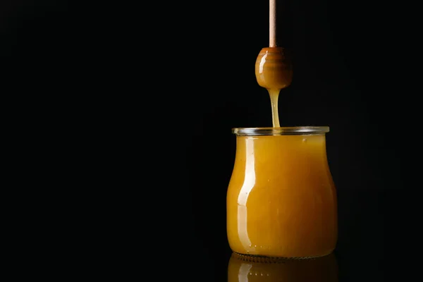 Honey Pouring Dipper Glass Jar Dark Background — Stock Photo, Image