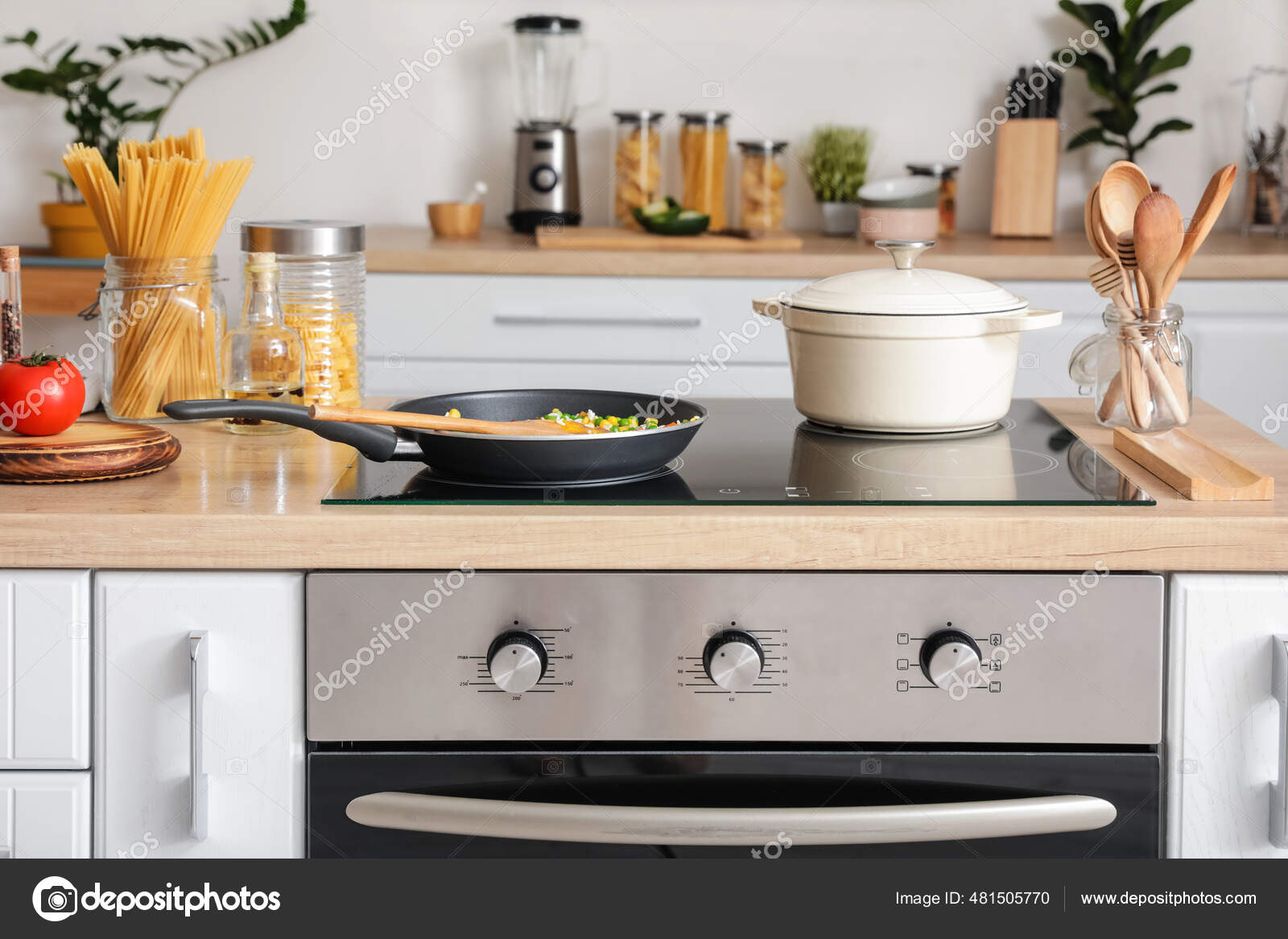 Modern Electric Stove Utensils Kitchen Stock Photo by ©serezniy 481505770