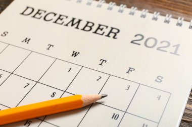 Kağıt takvim ve kalemi çevir, kapat