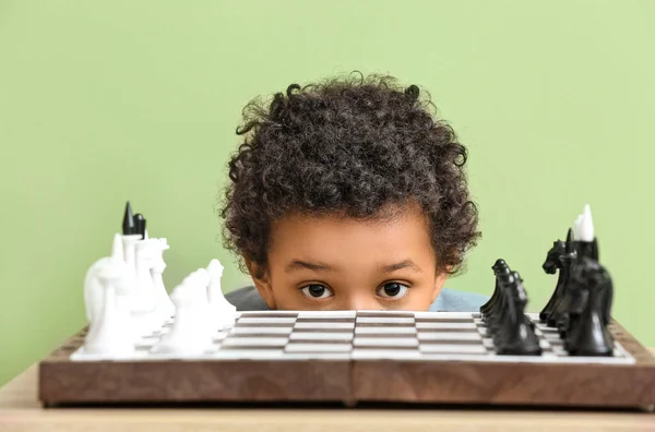 Cute African American Boy Playing Chess Color Background — Stock Photo, Image