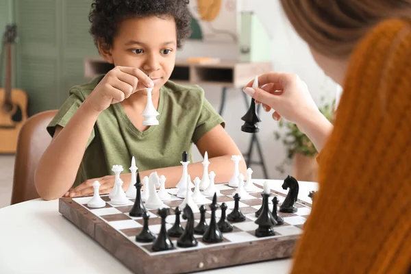 Cute African American Boy His Mother Playing Chess Home — Stock Photo, Image