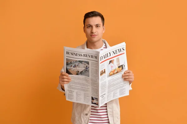 Handsome Young Man Reading Newspaper Color Background — Stock Photo, Image