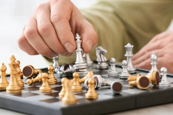 Man Playing Chess Wooden Table Closeup — Stock Photo, Image