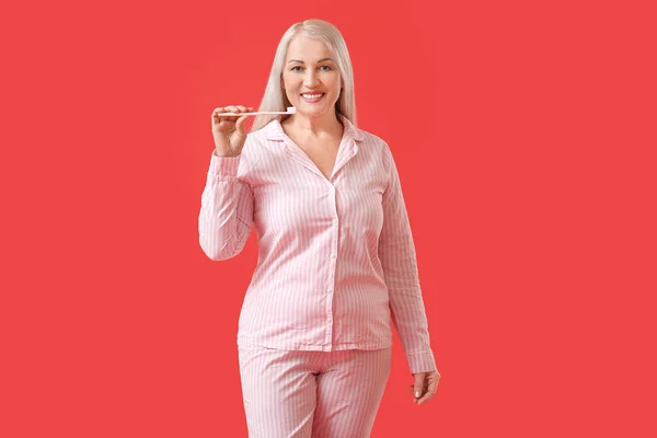 Mature Woman Brushing Teeth Color Background — Stock Photo, Image