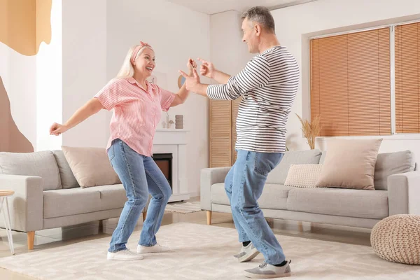 Happy Mature Couple Dancing Home — Stock Photo, Image