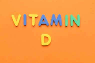 Renk arkaplanı üzerine metin VITAMIN D