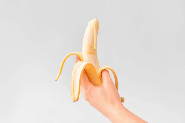 Female Hand Banana Grey Background Erotic Concept — Stock Photo, Image