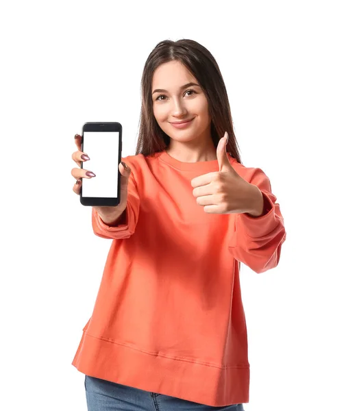 Ung Kvinna Med Mobiltelefon Visar Tummen Upp Vit Bakgrund — Stockfoto