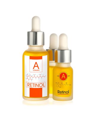 Beyaz arka planda A vitamini yağı şişeleri