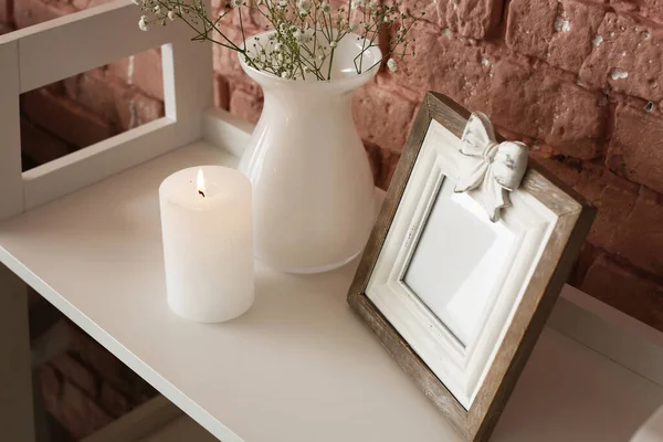 Burning Candle Picture Frame Vase Table Brick Wall — Stock Photo, Image