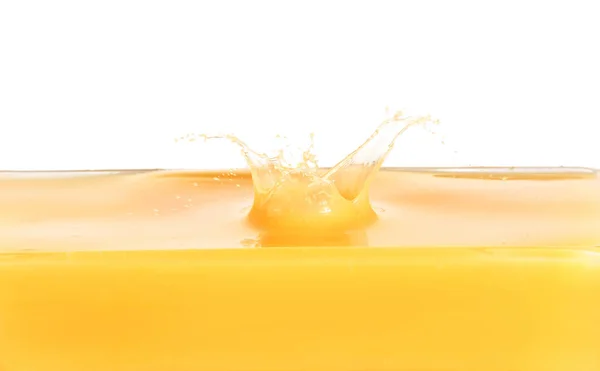 Spritzer Frischer Orangensaft Auf Weißem Hintergrund — Stockfoto