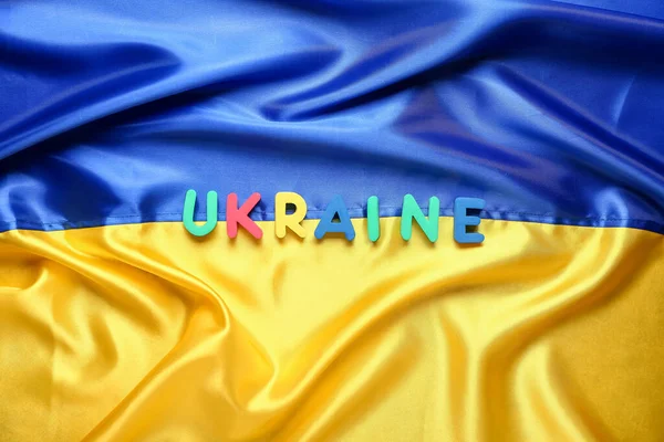 Palavra Ucrânia Sobre Bandeira Nacional — Fotografia de Stock