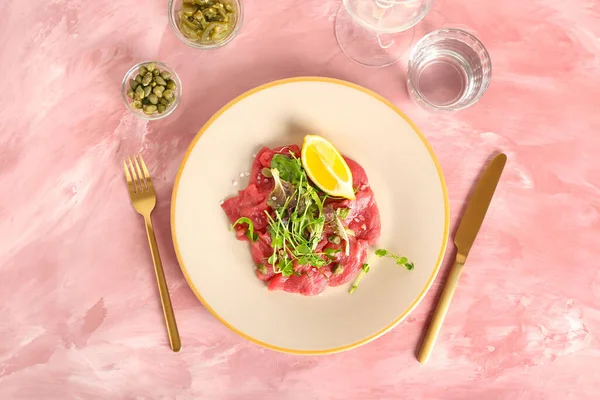 Plate Tasty Veal Carpaccio Glass Water Capers Canned Jalapeno Color — Stock Photo, Image