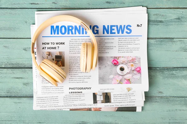 Newspapers Headphones Color Wooden Background — 图库照片