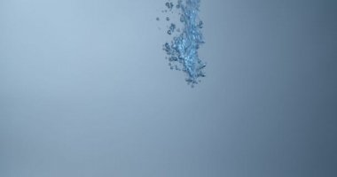 Bubbles in blue water, closeup