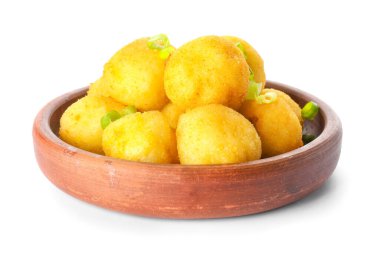 Bowl with fried potato balls on white background