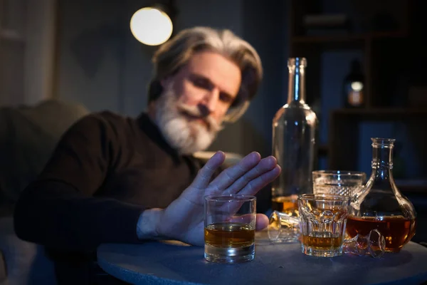 Senior Man Refusing Drink Whiskey Late Evening Home — Fotografia de Stock