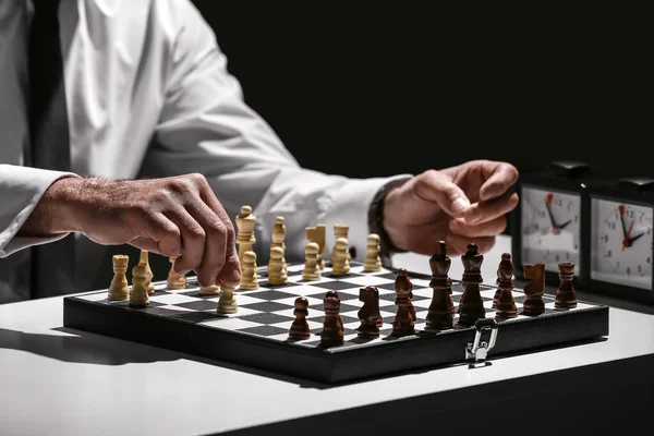 Senior Man Playing Chess Dark Background Closeup — Stock Photo, Image