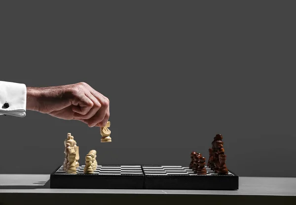 Senior Man Playing Chess Dark Background Closeup — ストック写真