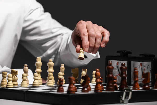 Senior Man Playing Chess Dark Background Closeup — Stockfoto