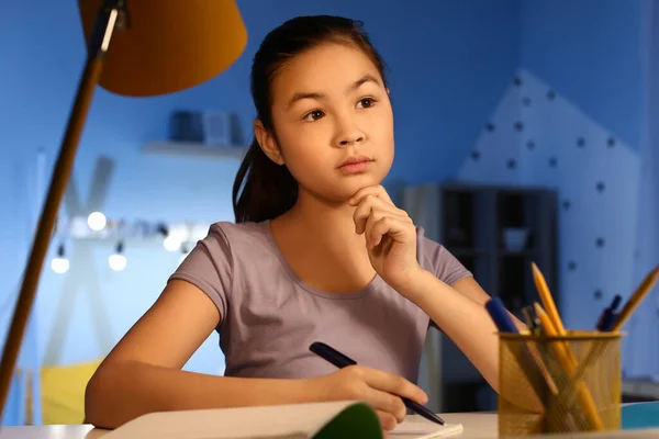 Thoughtful Little Girl Doing Homework Home Late Evening — Stock Photo, Image