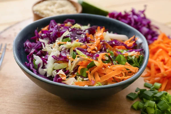 Bowl Tasty Cabbage Salad Ingredients Wooden Table — Stock Photo, Image