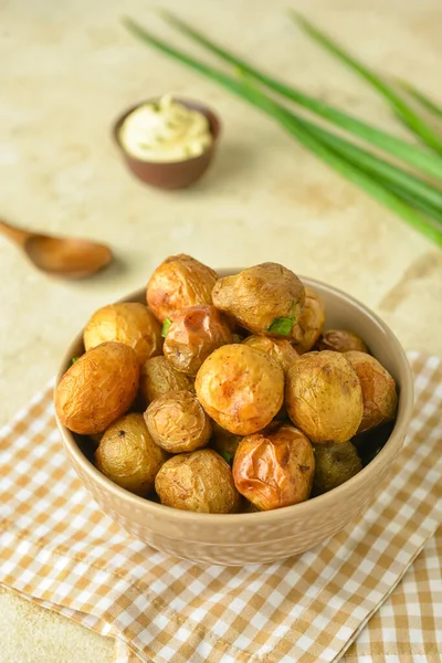 Bowl Tasty Baked Potato Light Background — Stock Photo, Image