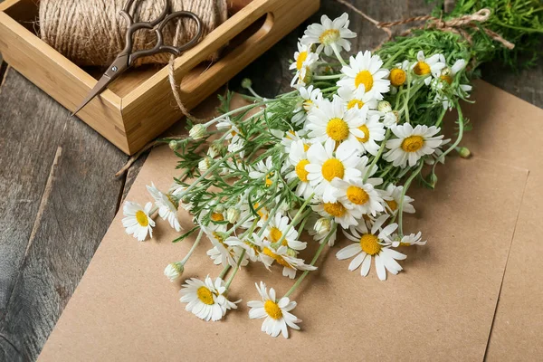 Bouquet Beautiful Chamomile Flowers Scissors Rope Craft Paper Wooden Background — Stock Photo, Image