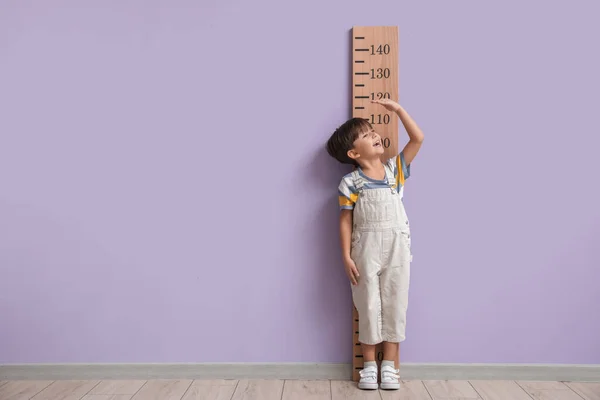 Little Boy Measuring Height Color Wall — Stock Photo, Image